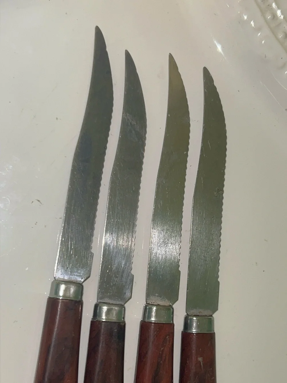 Quikut brown-handled steak knives Set of 4
